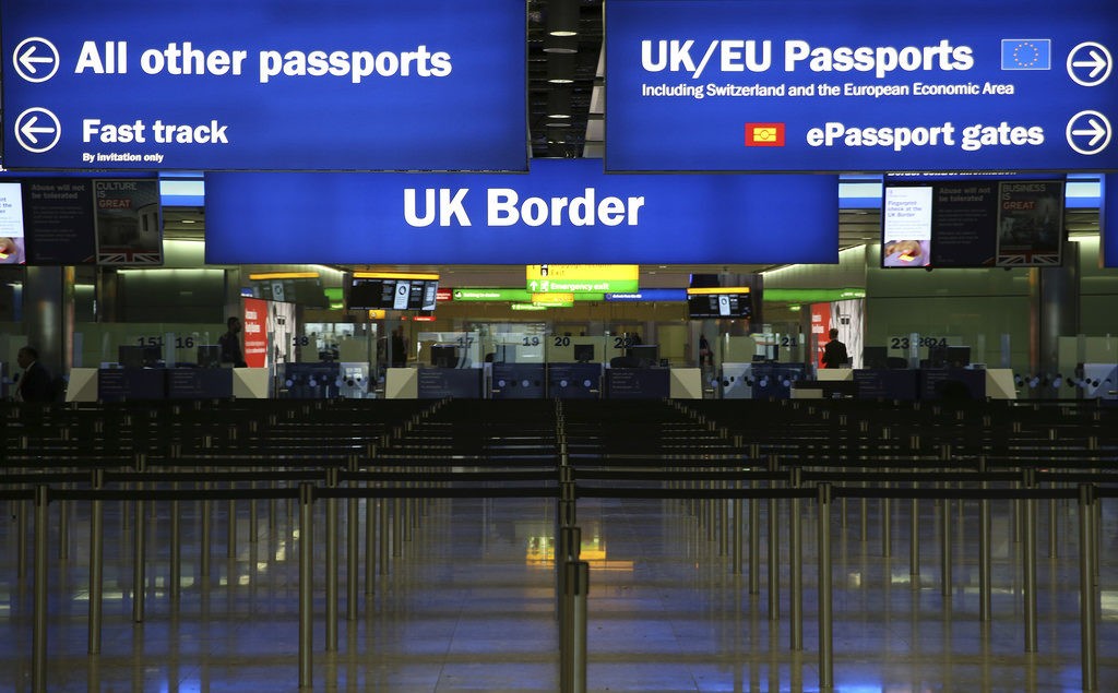 a picture of border control at a UK airport