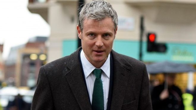 Conservative MP Zac Goldsmith walking outside his office