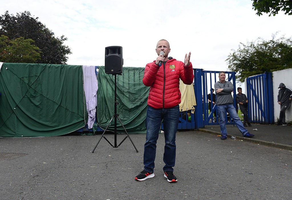 Pacemaker Press 09-07-2019: Supporters of the Avoniel Leisure Centre in Belfast, Northern Ireland had a protest about belfast city council's initial decision to remove bonfire material that has not been reversed. Women from the area surround the bonfire in Avoniel on Tuesday evening as a protest. Jamie Bryson pictured at the Protest. Picture By: Arthur Allison.