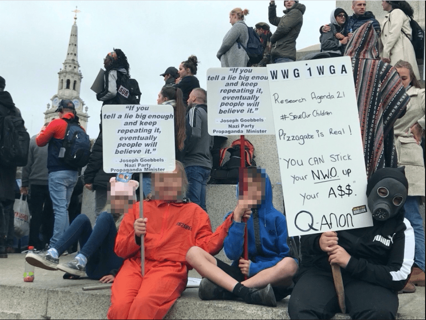 Children with signs at an anti-lockdown demonstration, Trafalgar Square, London, 26 September 2020. 